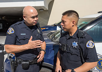 two officers talking